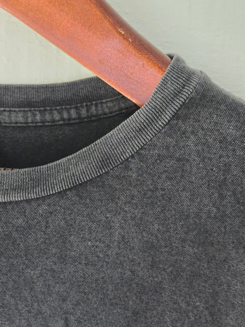 Detail view of black color and ribbing around neck